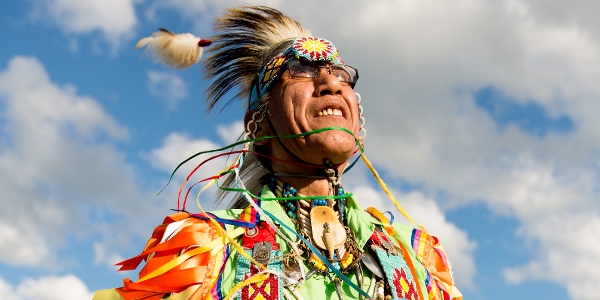Native person in regalia at Red Bottom Celebration